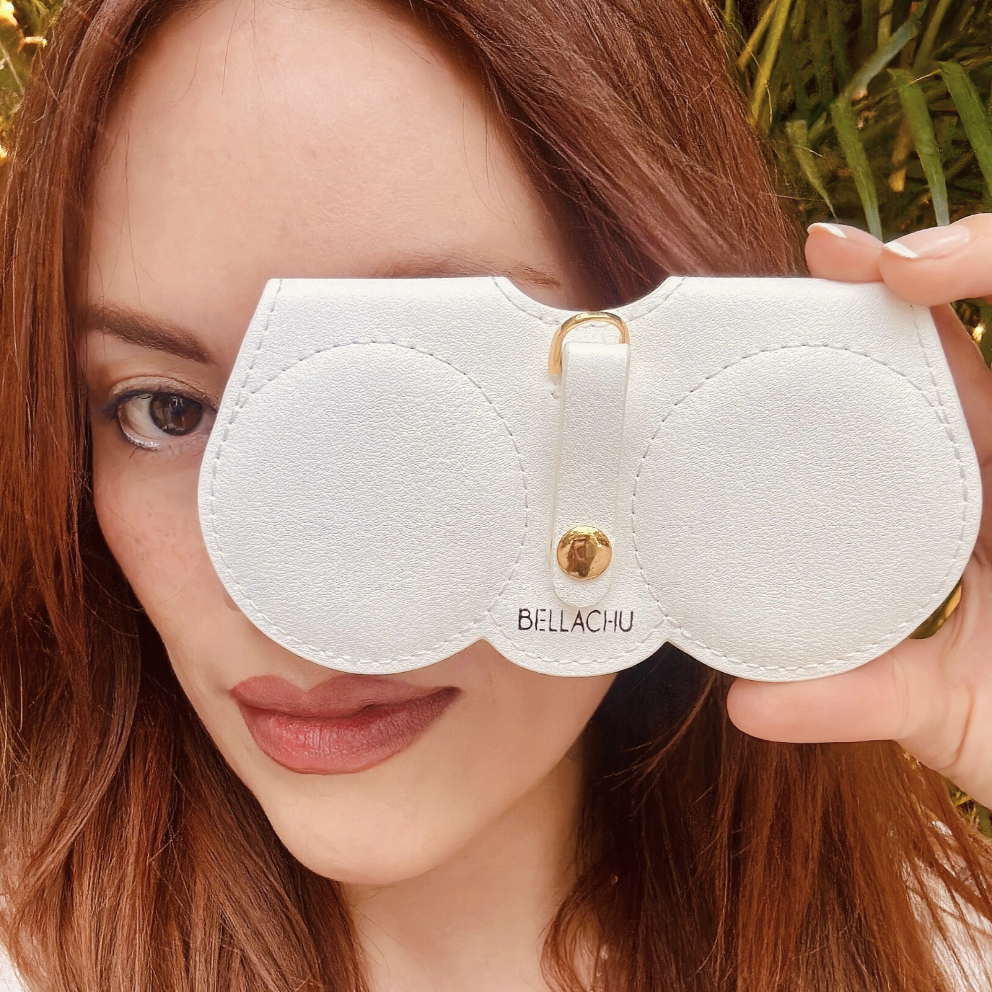 Viral clip-on glasses case on purse