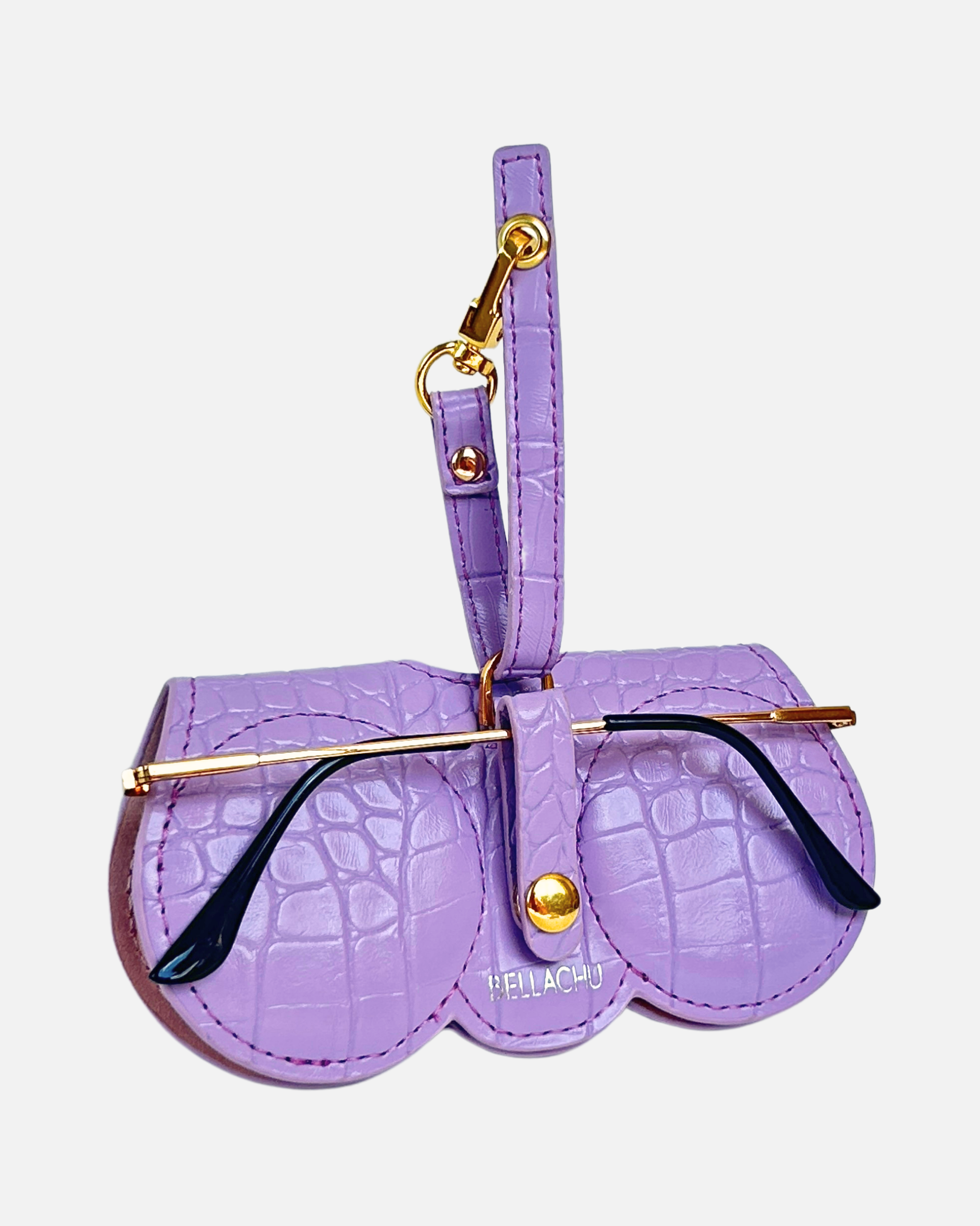 Viral clip-on glasses case on purse