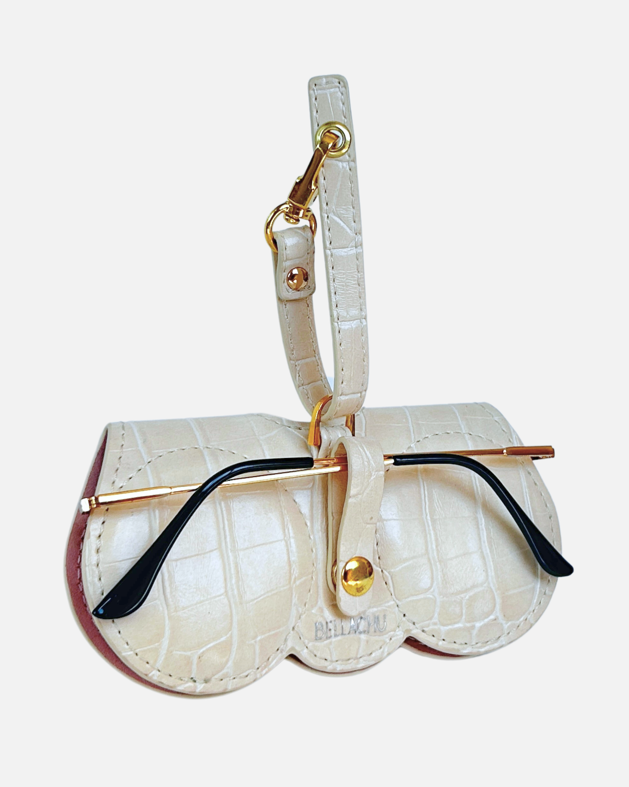 Viral clip-on glasses case on purse