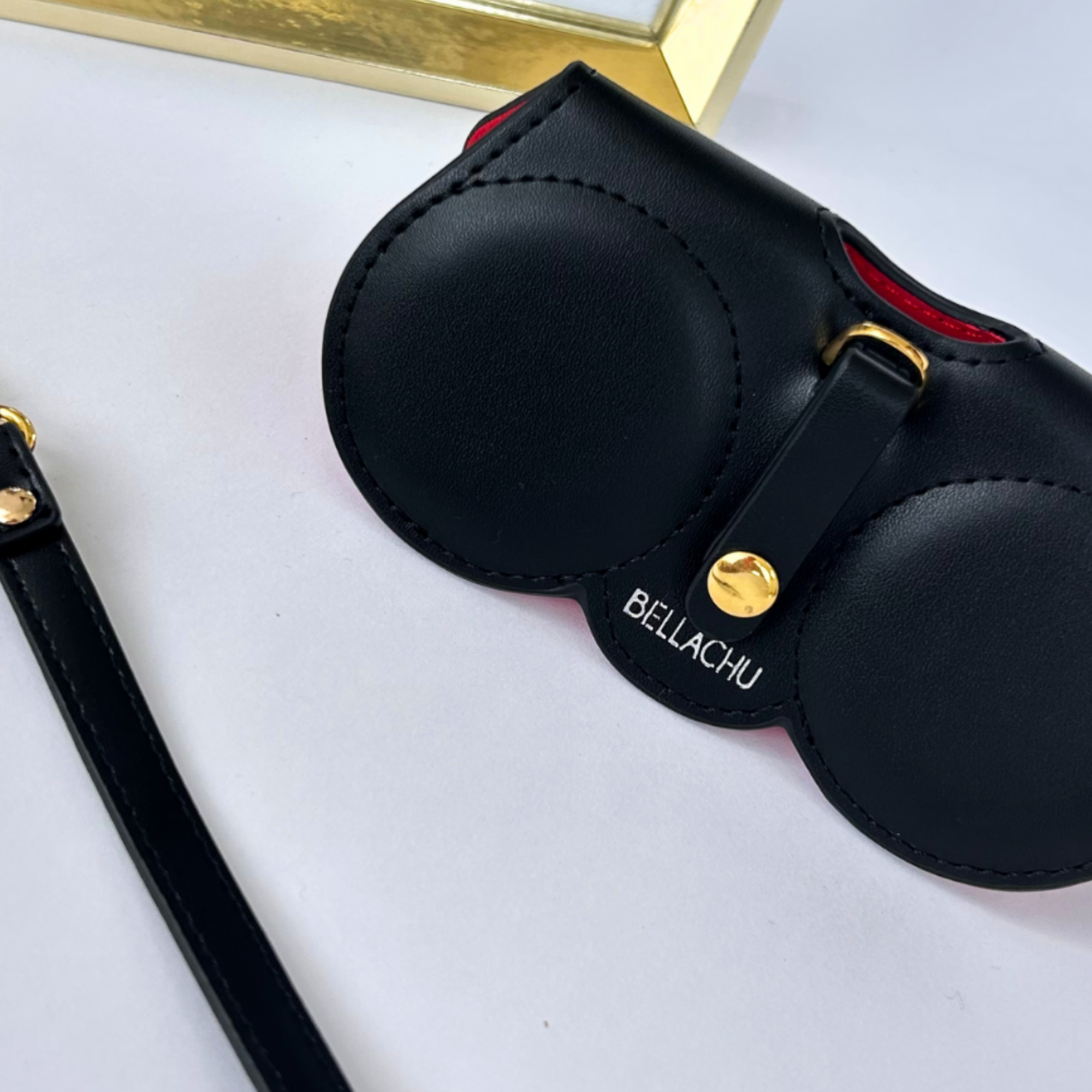 Viral clip-on glasses case on purse